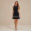 Sleeveless black mini dress with scalloped hem