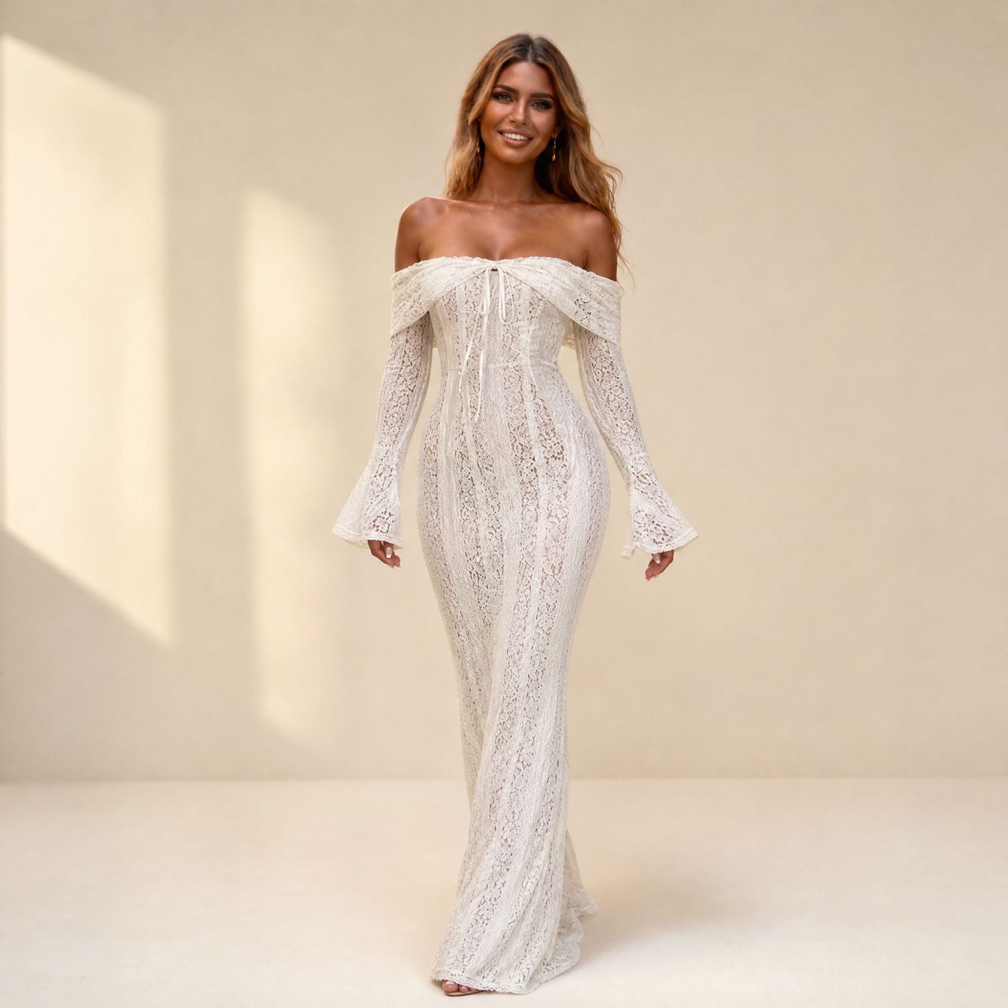White off-the-shoulder lace gown