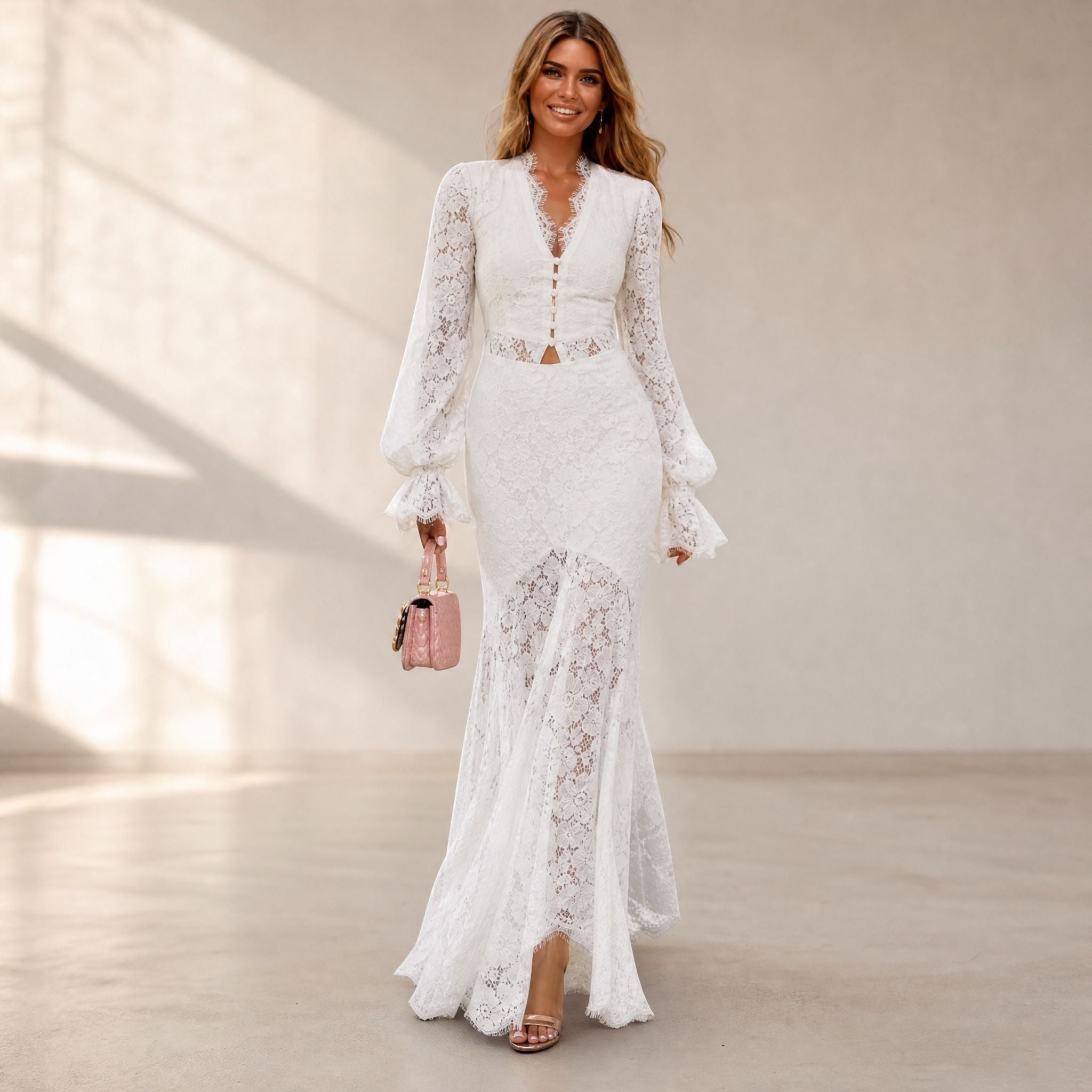 White long-sleeve plunging lace maxi dress